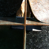 Das Kreuz vor dem Dreieck